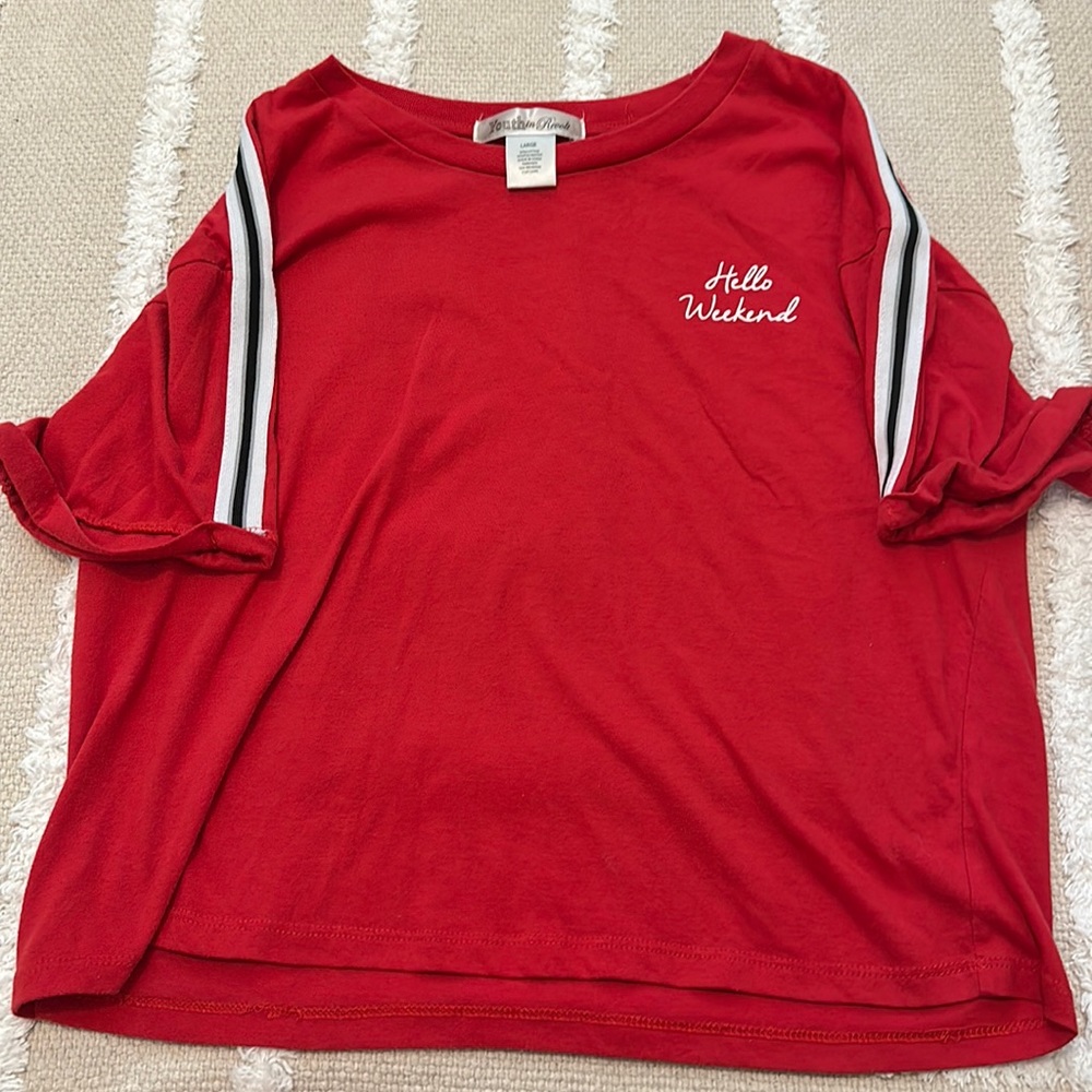A red T-shirt with black and white stripes on the arm(worn a couple times)